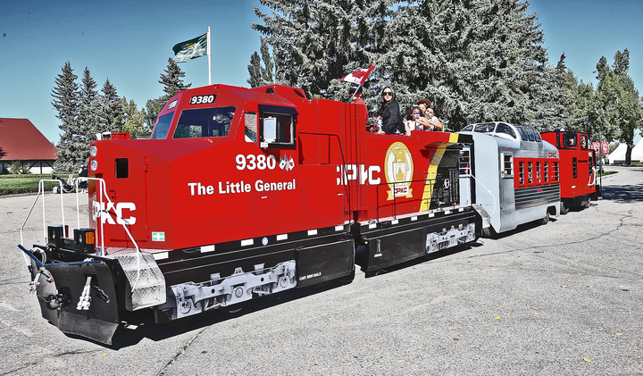 Red CPKC train engine. called "The little general"